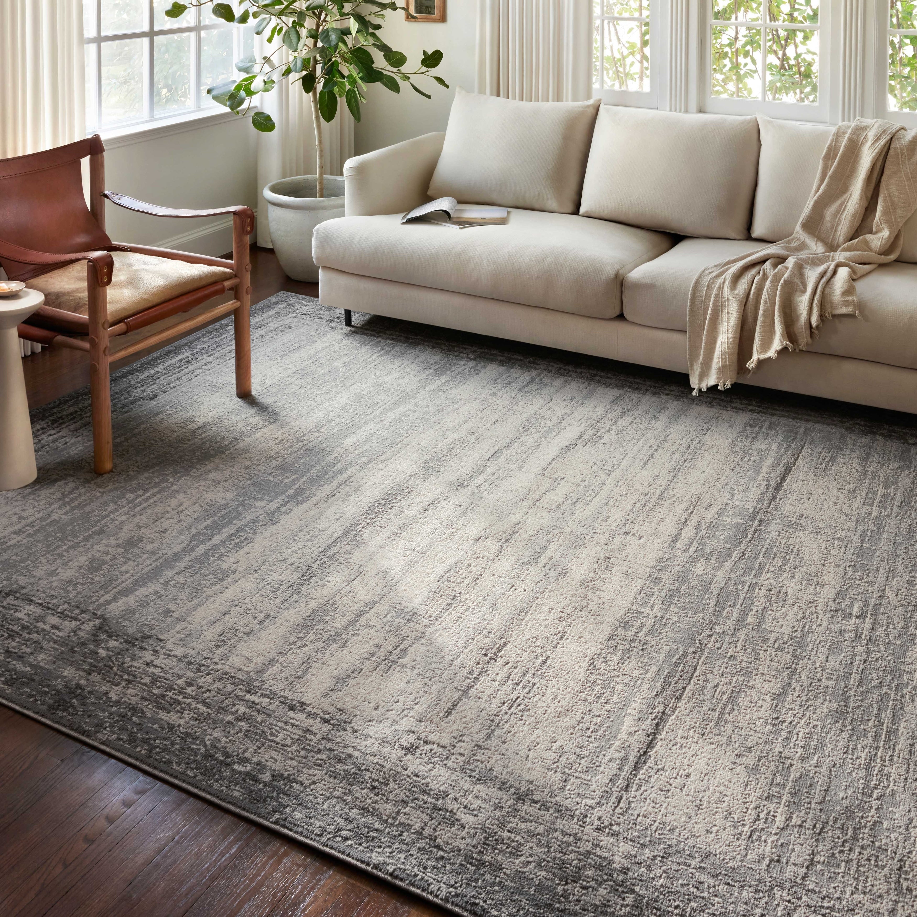 Tapis Alexander Home Grant moderne à bordure abstraite