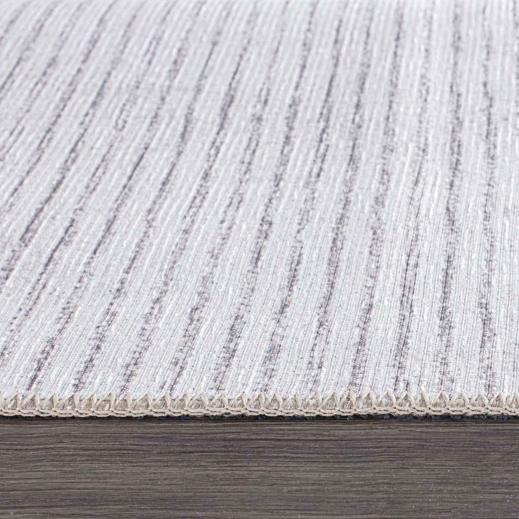 Tapis contemporain à rayures usées lavable en machine