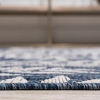 JONATHAN Y Tapis intérieur/extérieur à fronde de palmier Galon