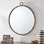 Miroir mural rond Marza finition laiton antique par iNSPIRE Q Modern